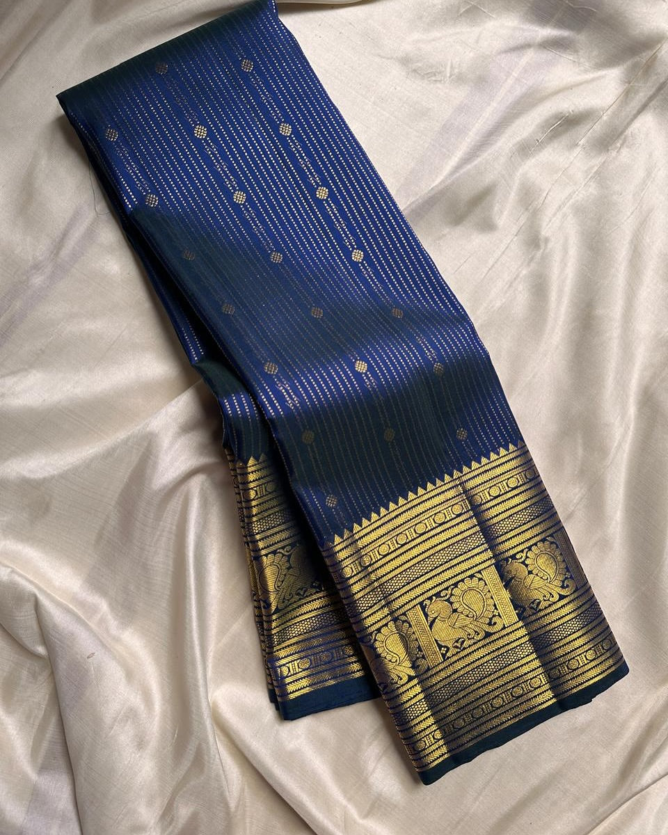Tempting Navy Blue Soft Banarasi Silk Saree With Enigmatic Blouse Piece