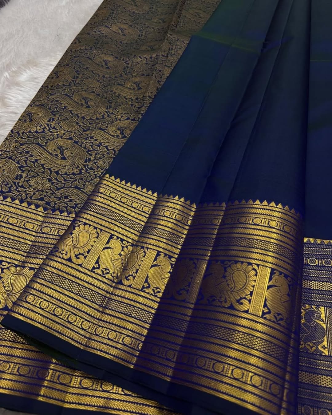 Tempting Navy Blue Soft Banarasi Silk Saree With Enigmatic Blouse Piece