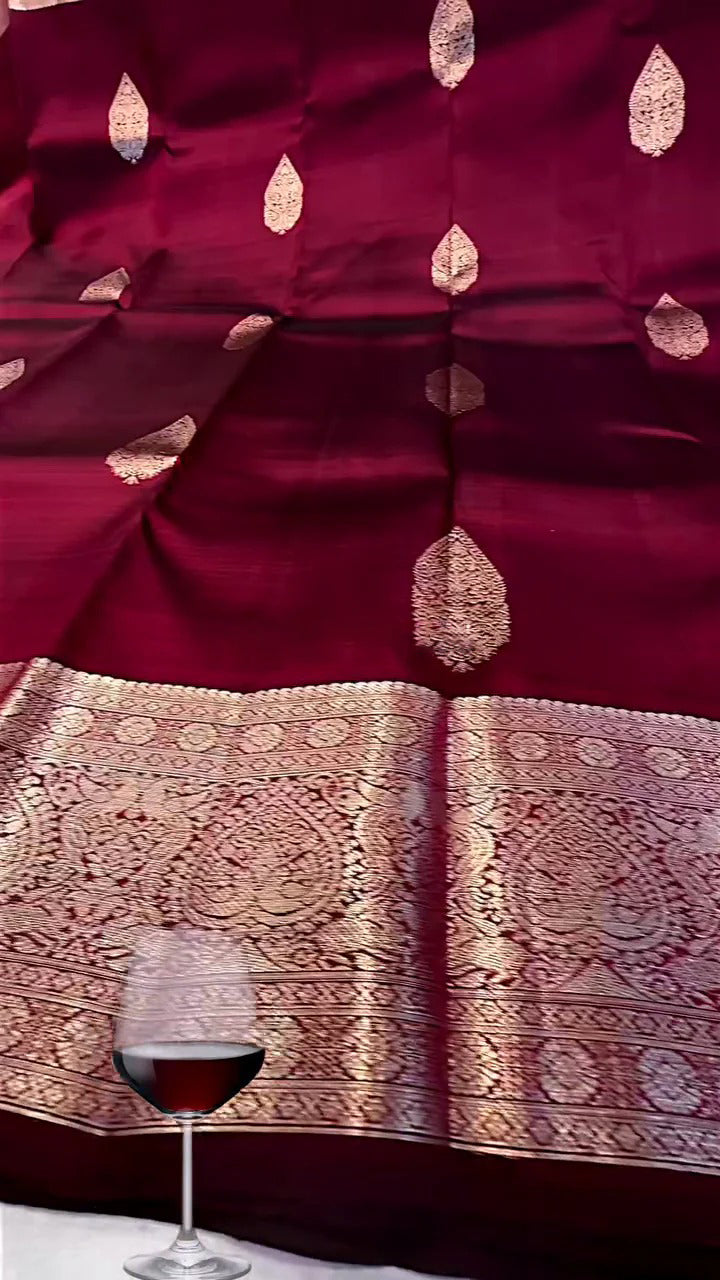 Gleaming Wine Soft Banarasi Silk Saree With Skinny Blouse Piece