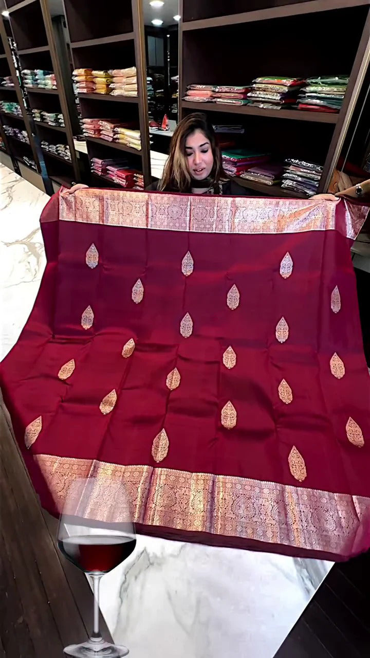 Gleaming Wine Soft Banarasi Silk Saree With Skinny Blouse Piece