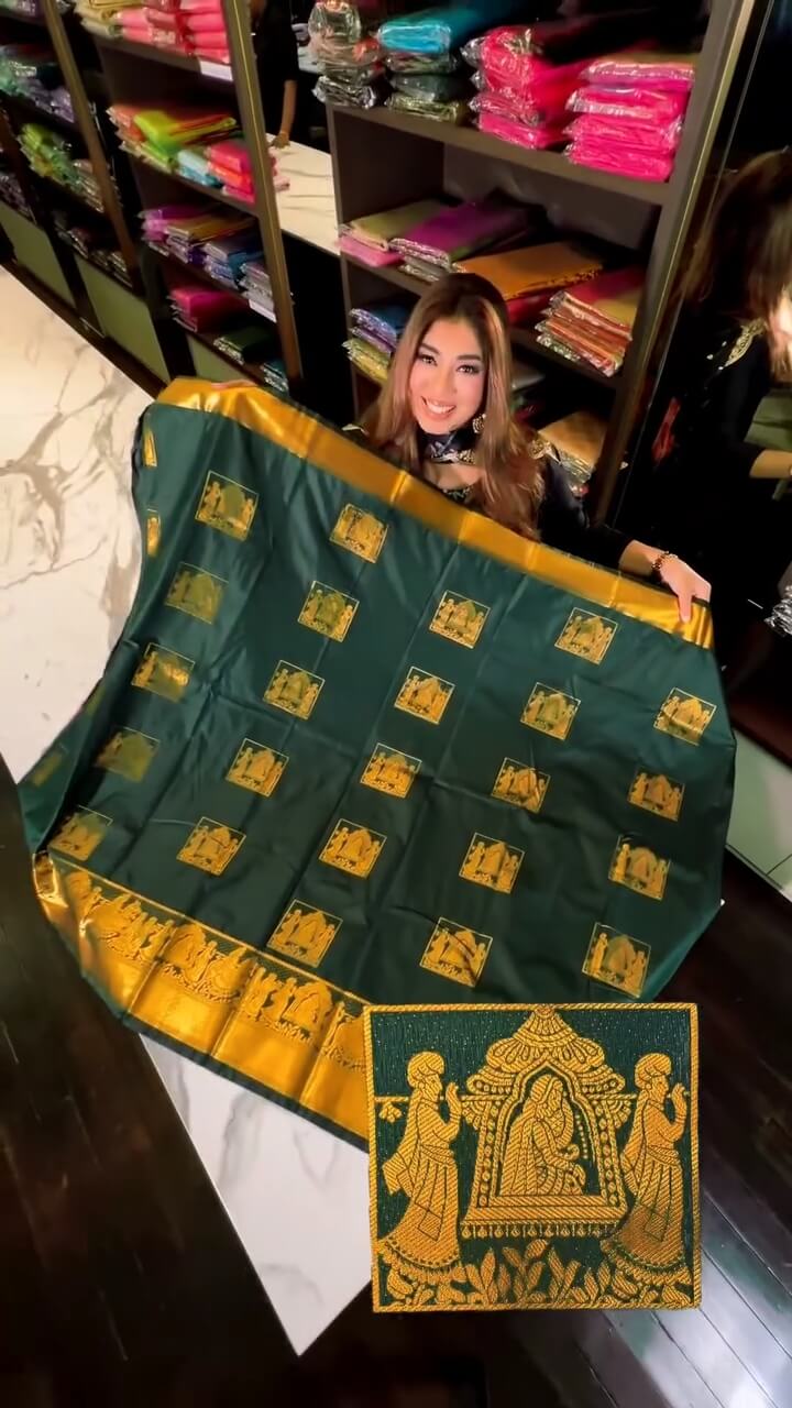 Evanescent Dark Green Soft Banarasi Silk Saree With Groovy Blouse Piece