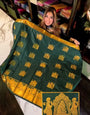 Evanescent Dark Green Soft Banarasi Silk Saree With Groovy Blouse Piece