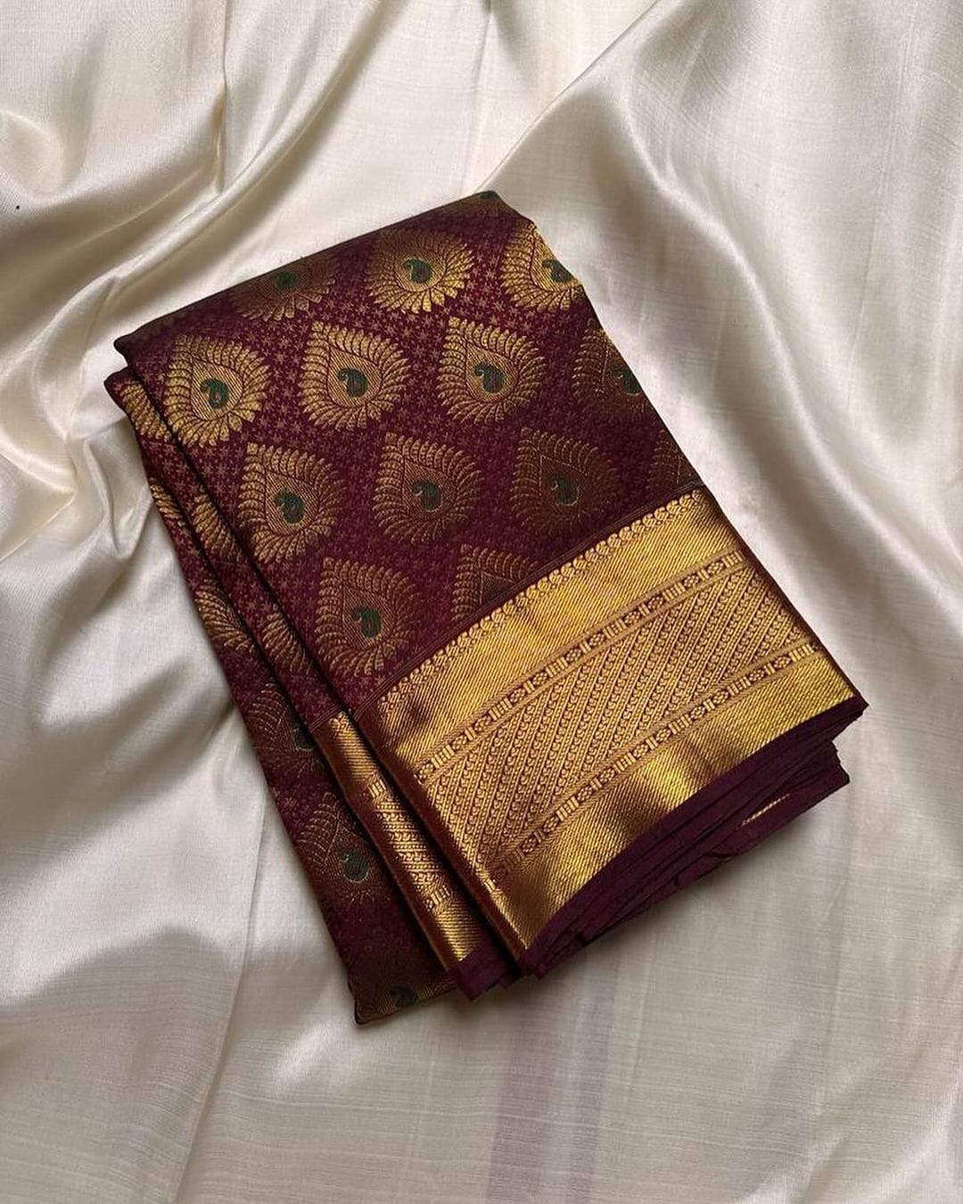 Eloquence Wine Soft Silk Saree With Pleasurable Blouse Piece