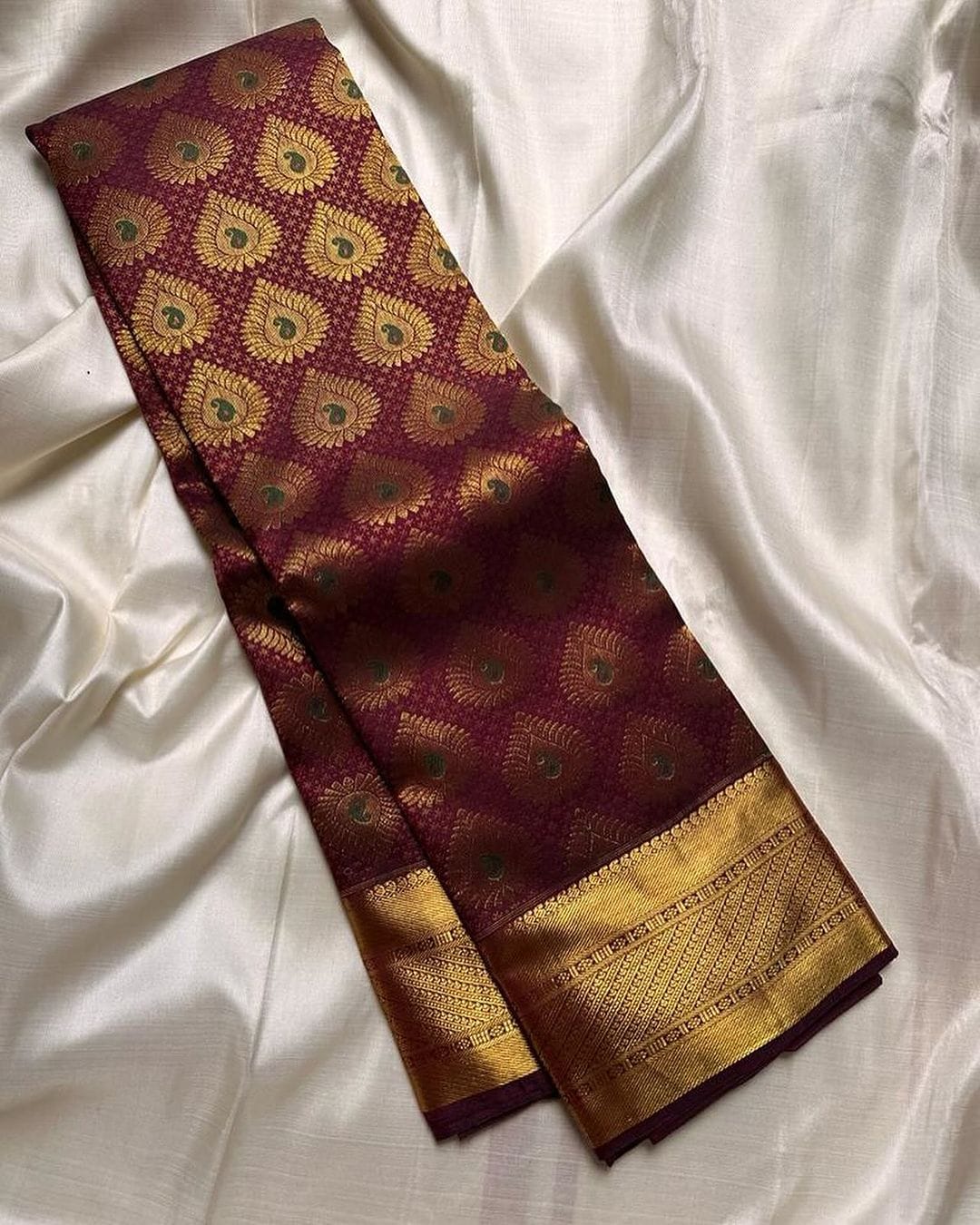 Eloquence Wine Soft Silk Saree With Pleasurable Blouse Piece