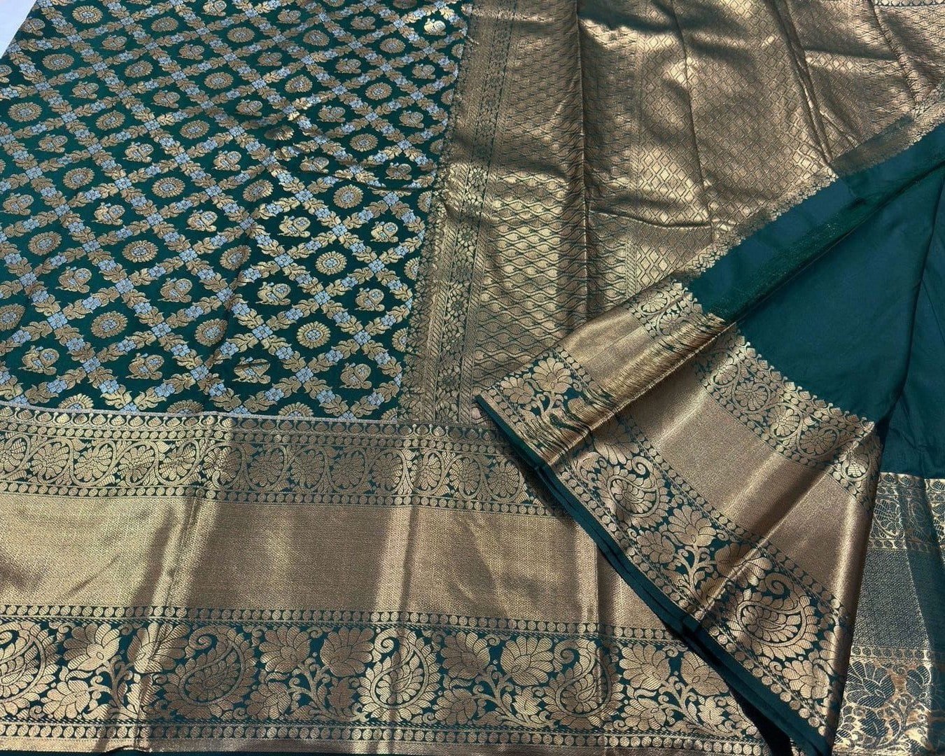 Hypnotic Dark Green Soft Silk Saree With Prettiest Blouse Piece