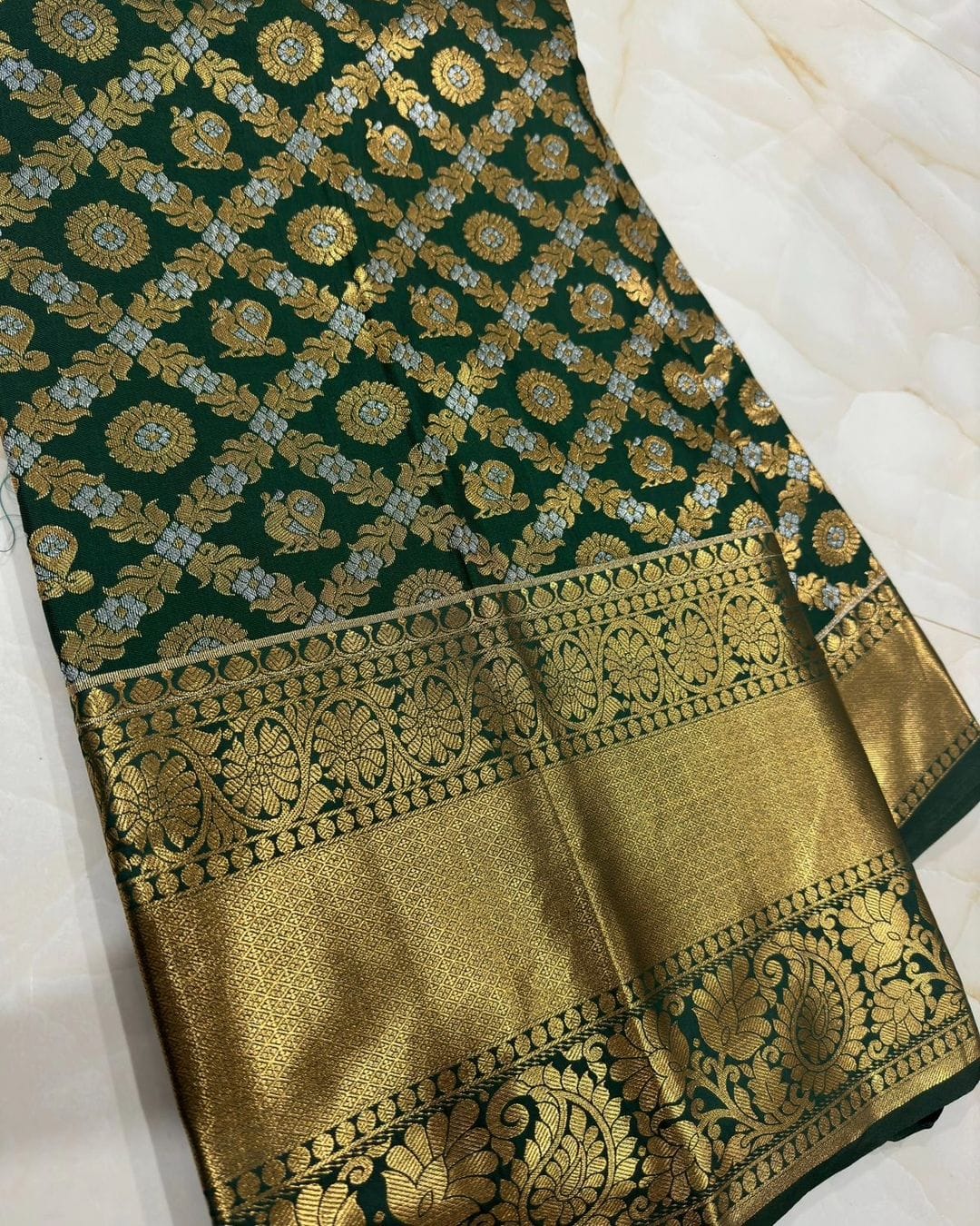 Hypnotic Dark Green Soft Silk Saree With Prettiest Blouse Piece