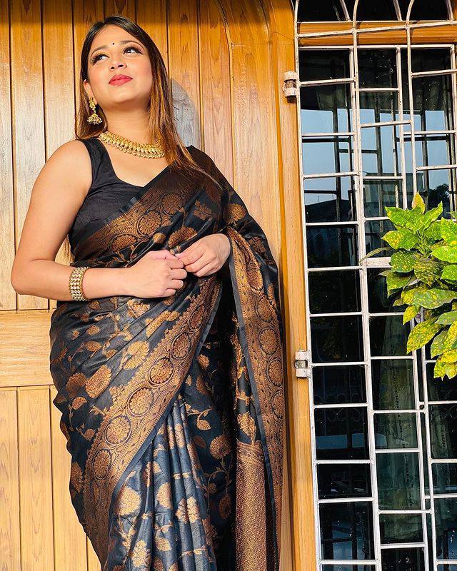 Rhapsodic Black Soft Silk Saree With Nectarous Blouse Piece