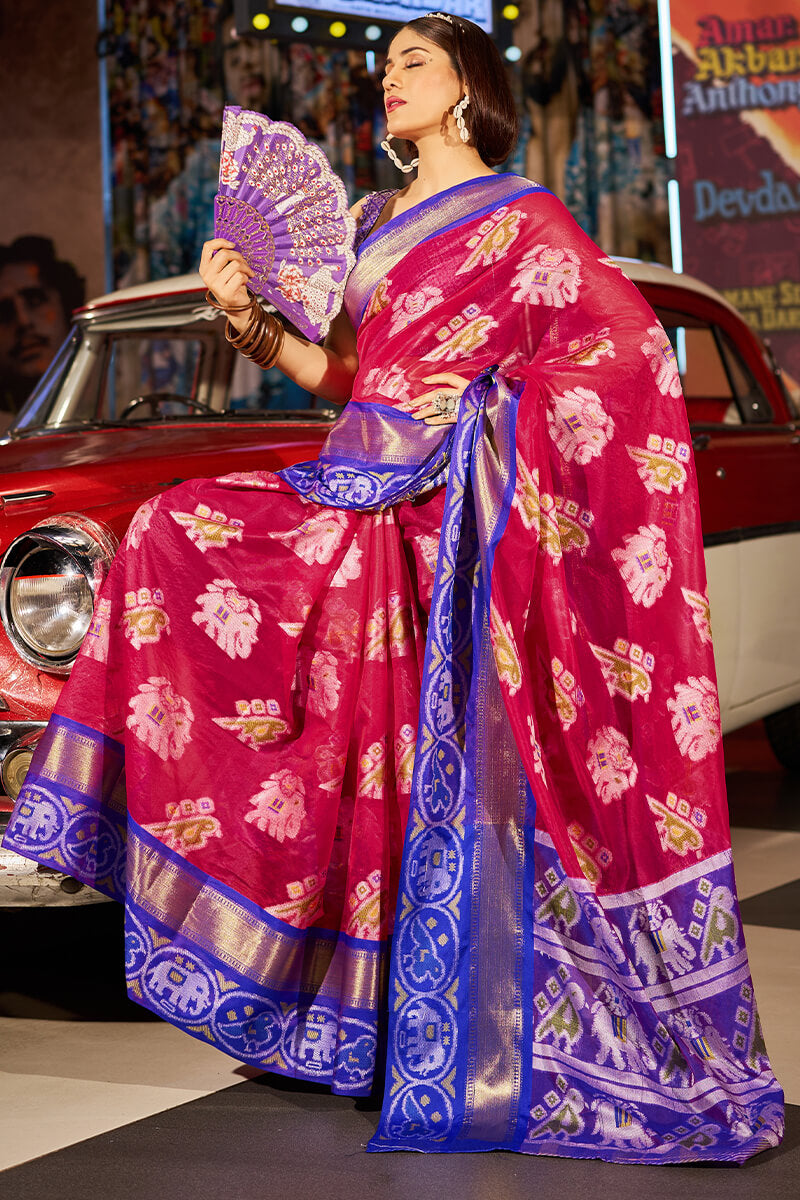 Beguiling Dark Pink Patola Silk Saree with Denouement Blouse Piece