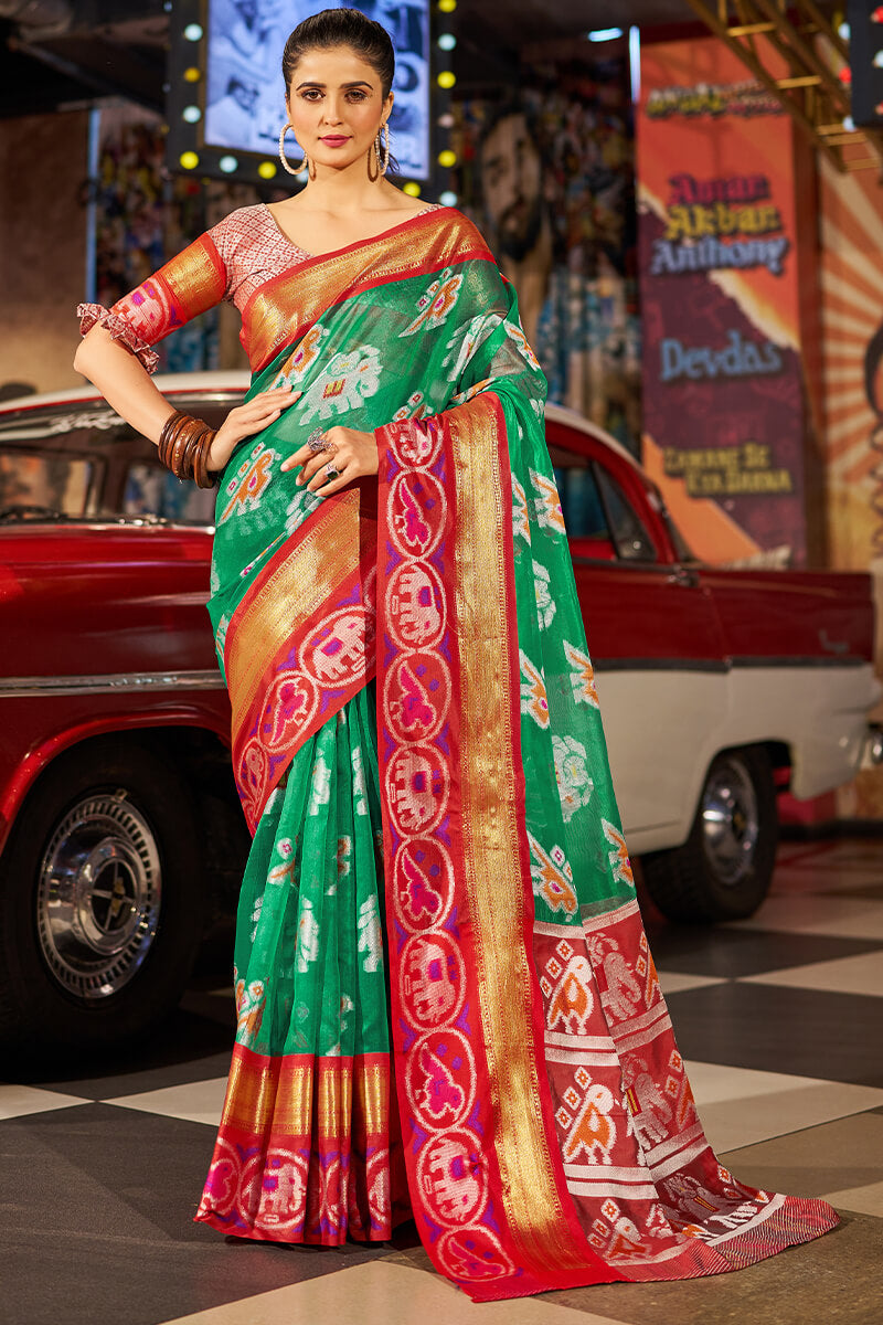 Exuberant Green Patola Silk Saree with Redolent Blouse Piece