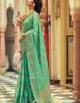 Tempting Sea Green Soft Banarasi Silk Saree With Flameboyant Blouse Piece