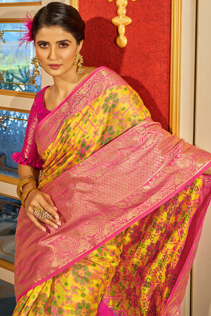 Nectarous Yellow Patola Silk Saree with Denouement Blouse Piece