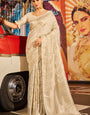 Gossamer Beige Soft Banarasi Silk Saree With Brood Blouse Piece