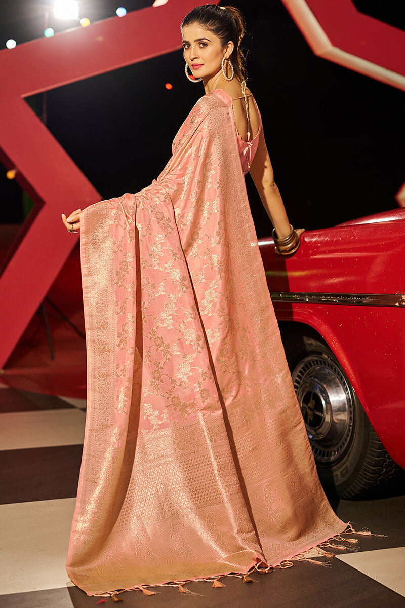 A dreamy Peach Soft Banarasi Silk Saree With Flamboyant Blouse Piece