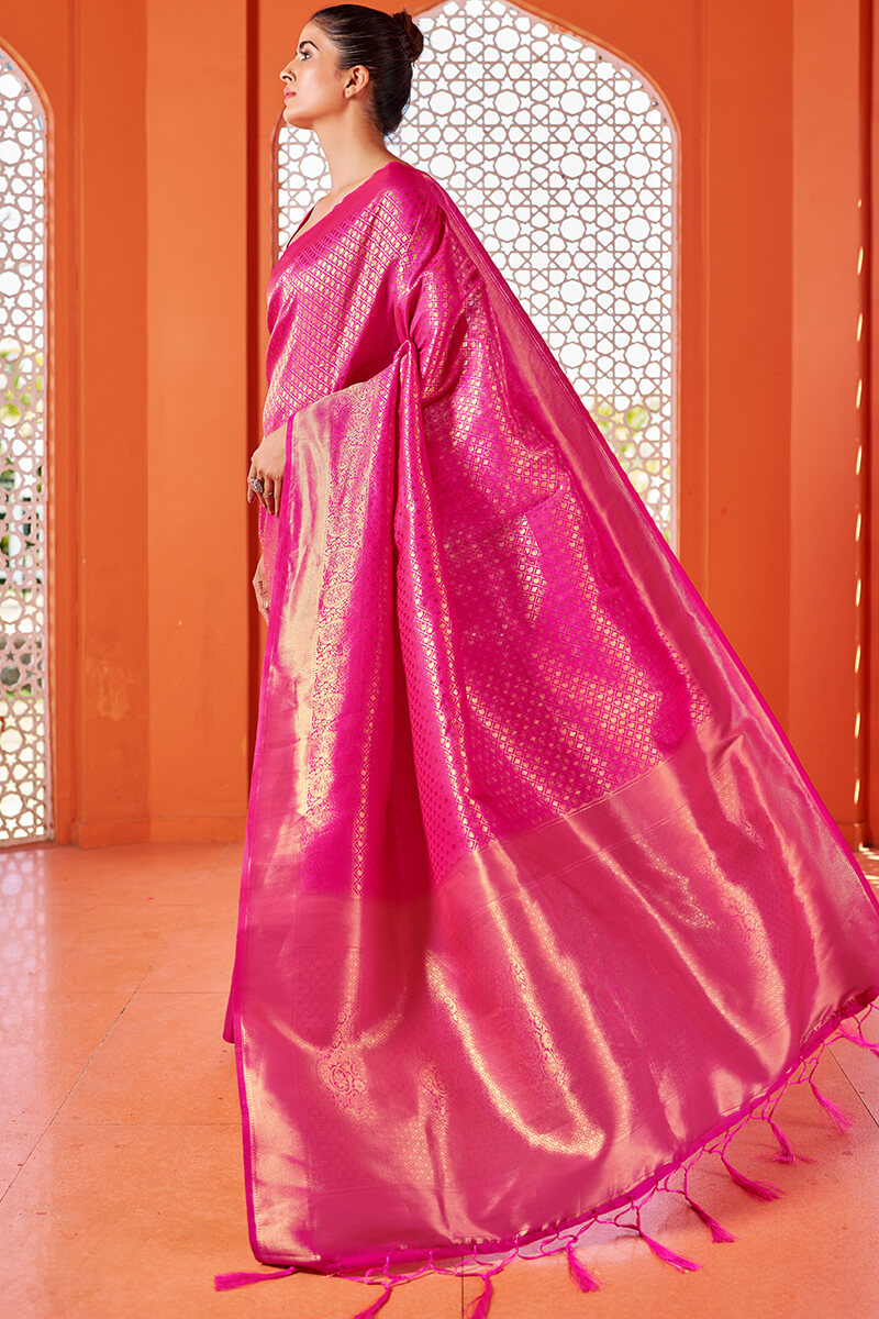 Twirling Dark Pink Kanjivaram Silk Saree With Surpassing Blouse Piece