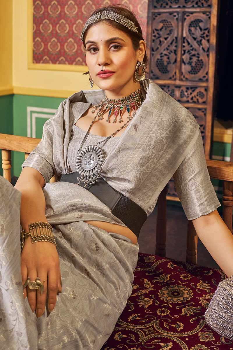 Devastating Grey Soft Banarasi Silk Saree With Efflorescence Blouse Piece