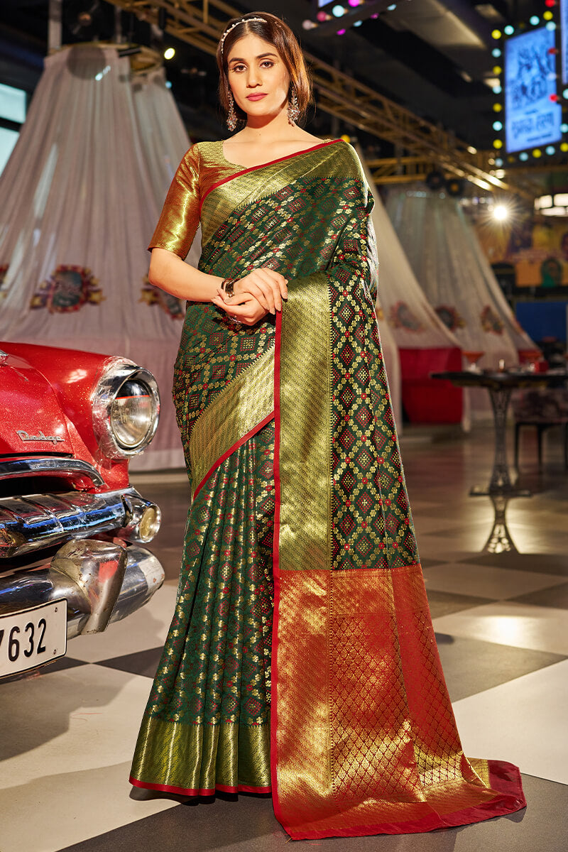 Moiety Dark Green Patola Silk Saree with Tempting Blouse Piece