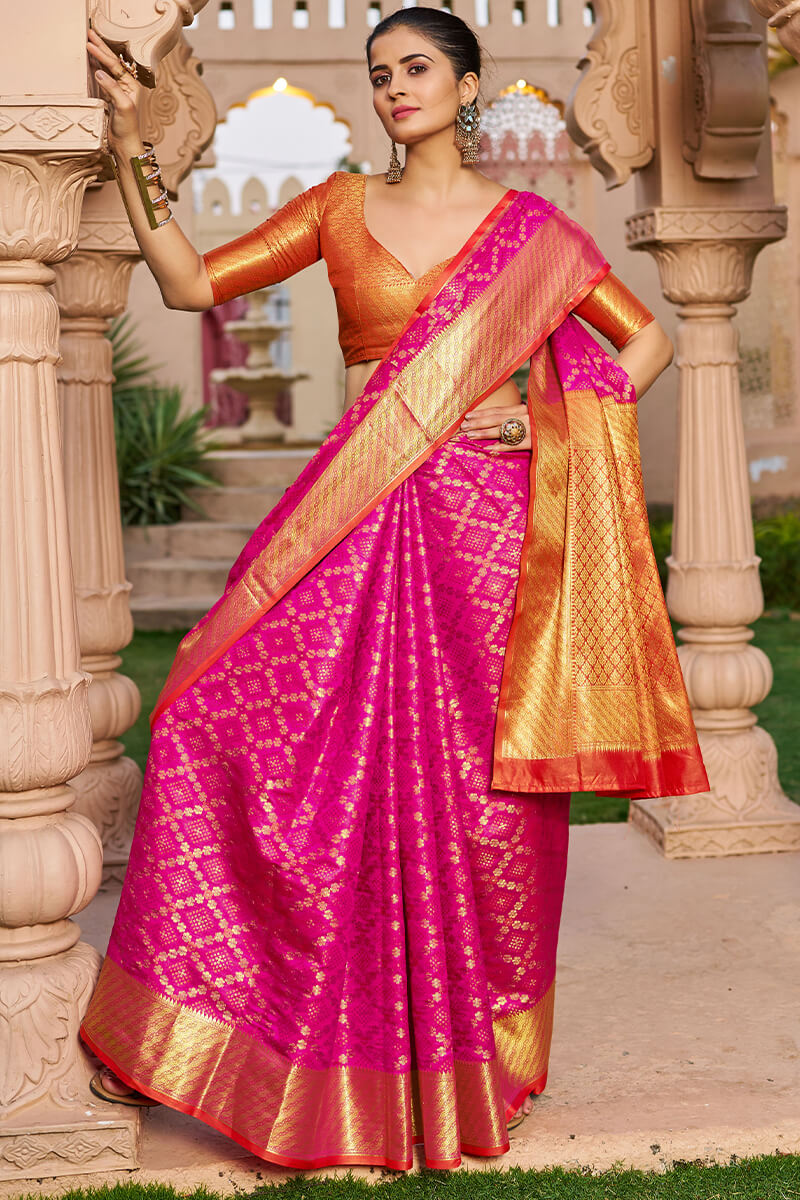 Lassitude Dark Pink Patola Silk Saree with Angelic Blouse Piece