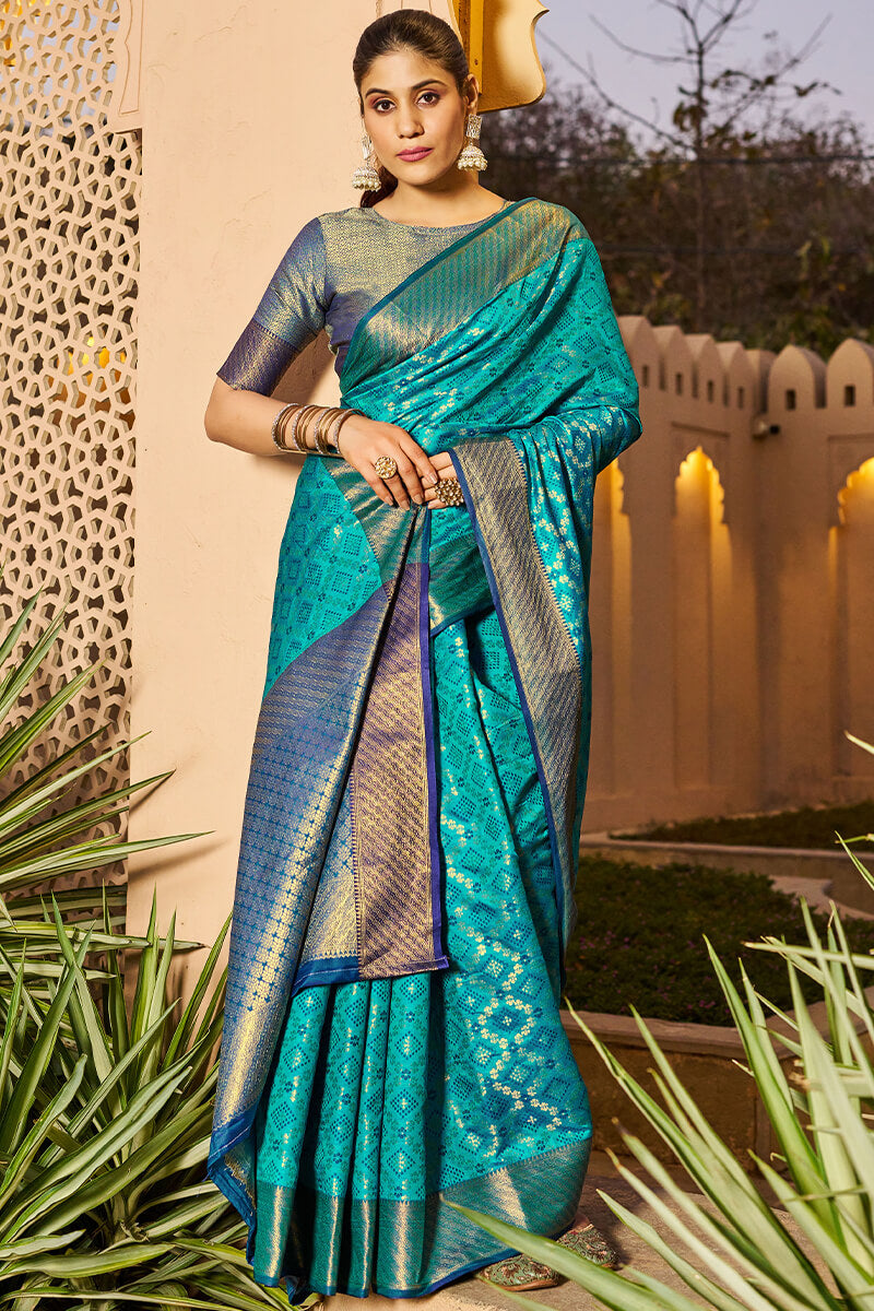 Groovy Firozi Patola Silk Saree with Dazzling Blouse Piece