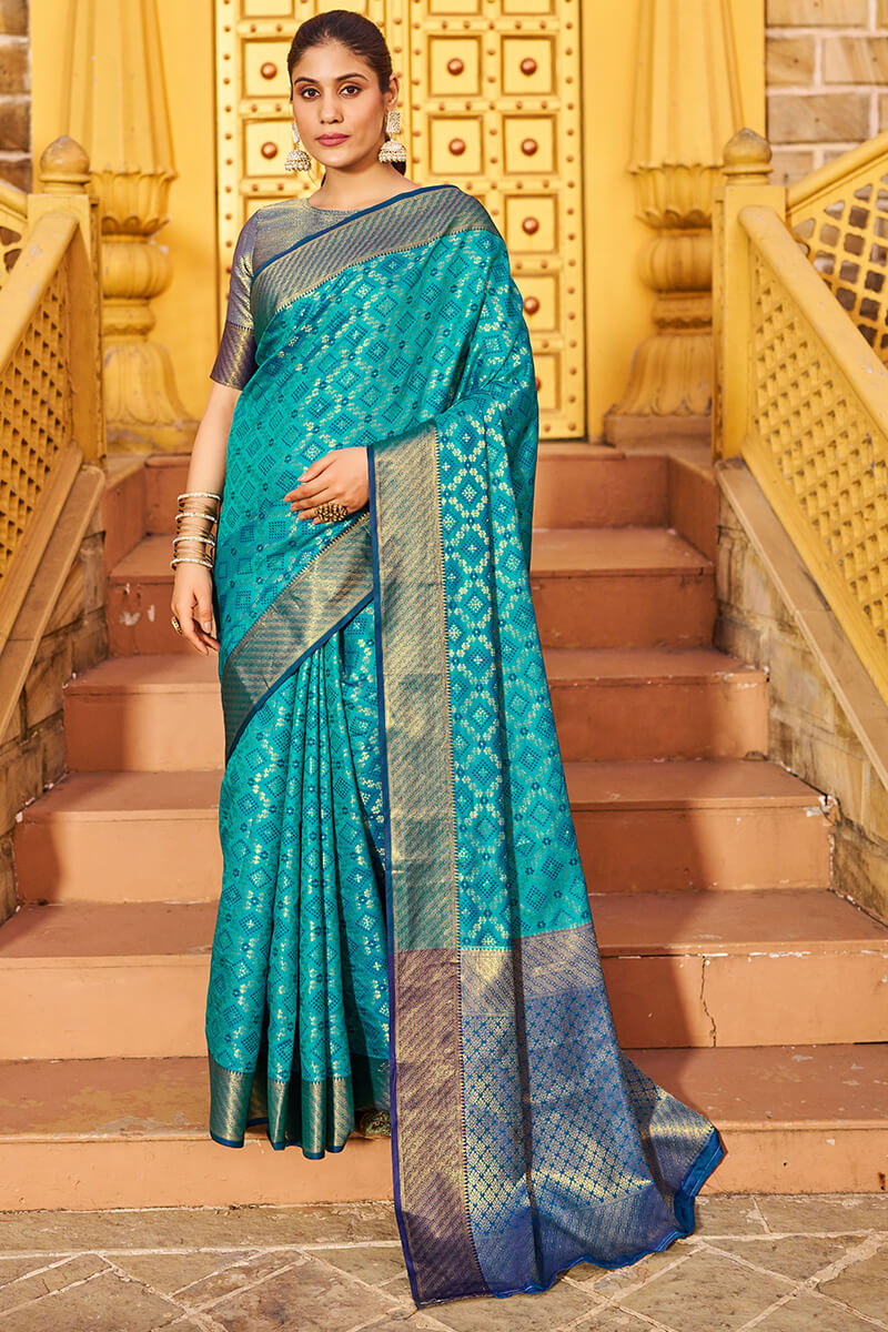 Groovy Firozi Patola Silk Saree with Dazzling Blouse Piece