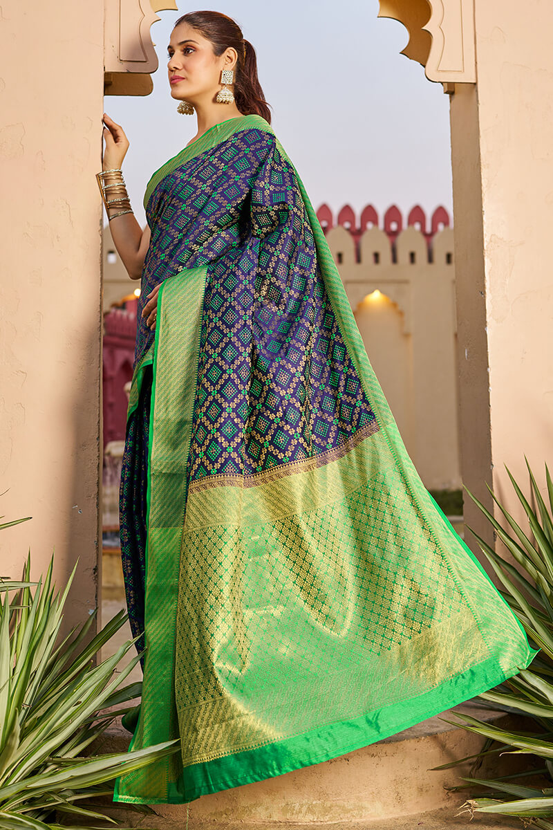 Marvellous Navy Blue Patola Silk Saree with An insanely Blouse Piece