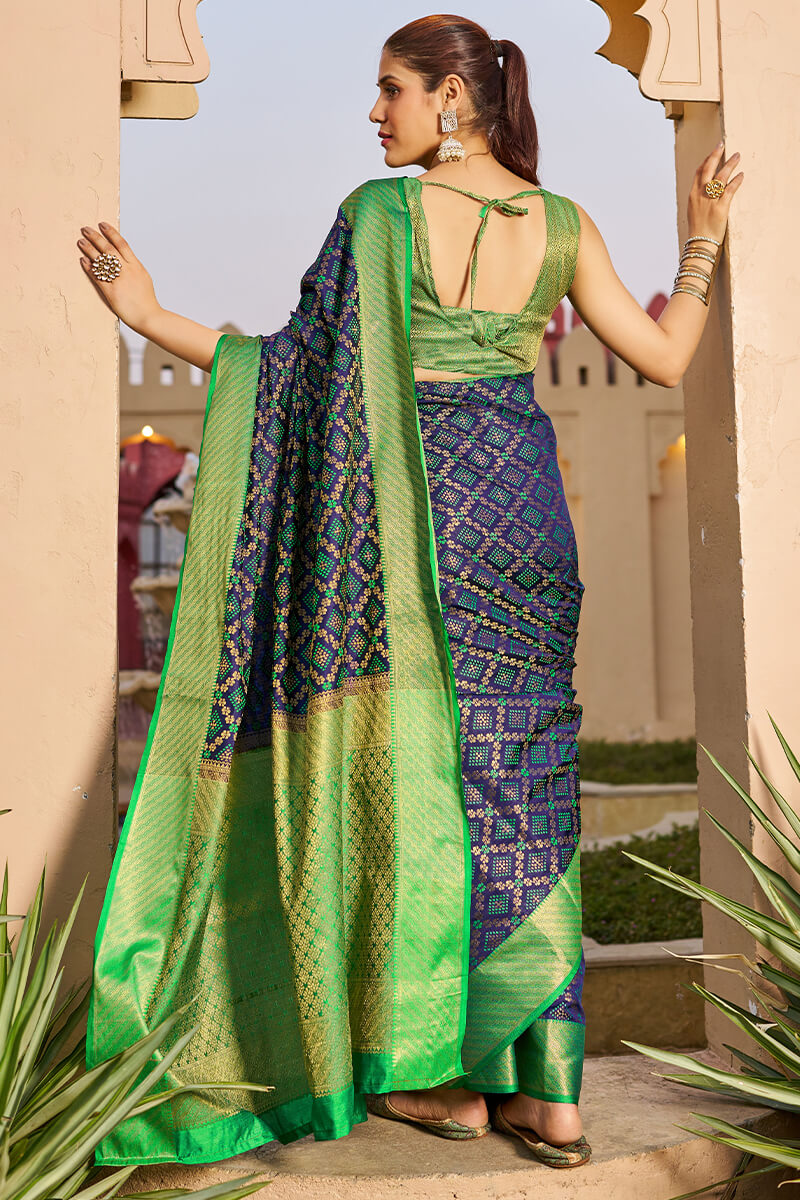 Marvellous Navy Blue Patola Silk Saree with An insanely Blouse Piece