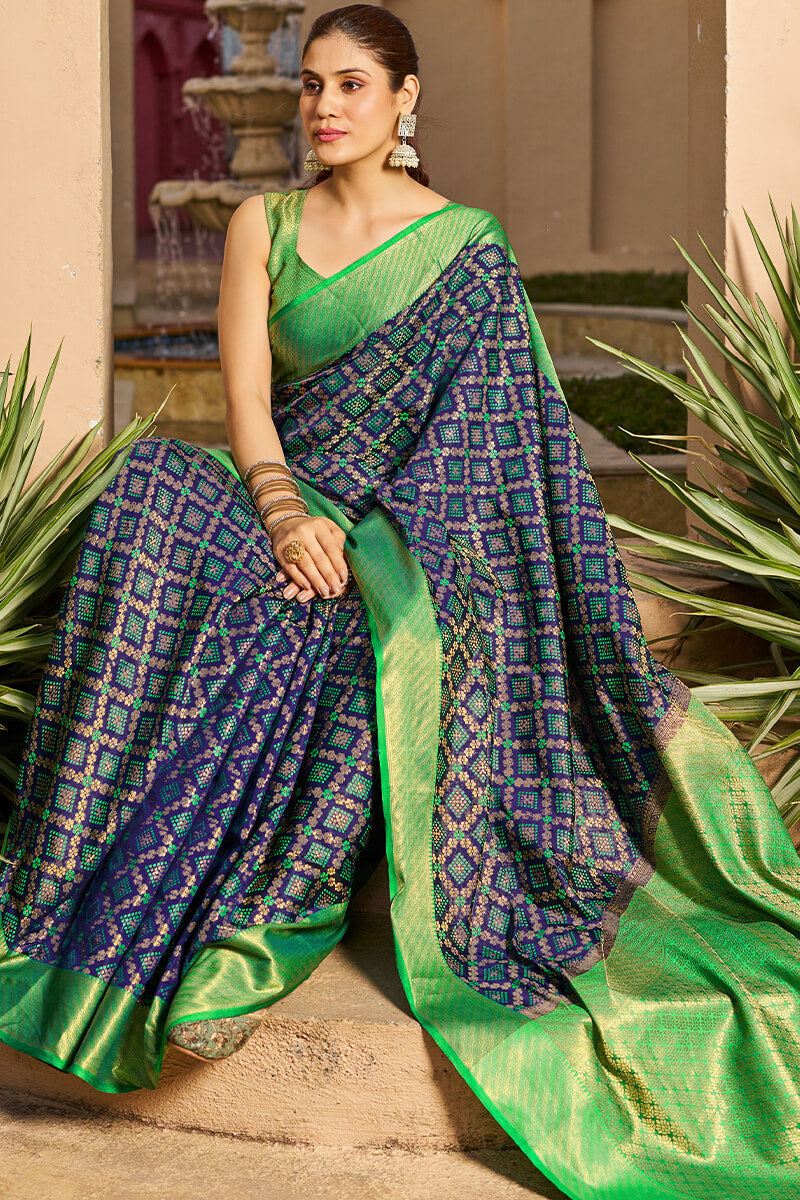 Marvellous Navy Blue Patola Silk Saree with An insanely Blouse Piece