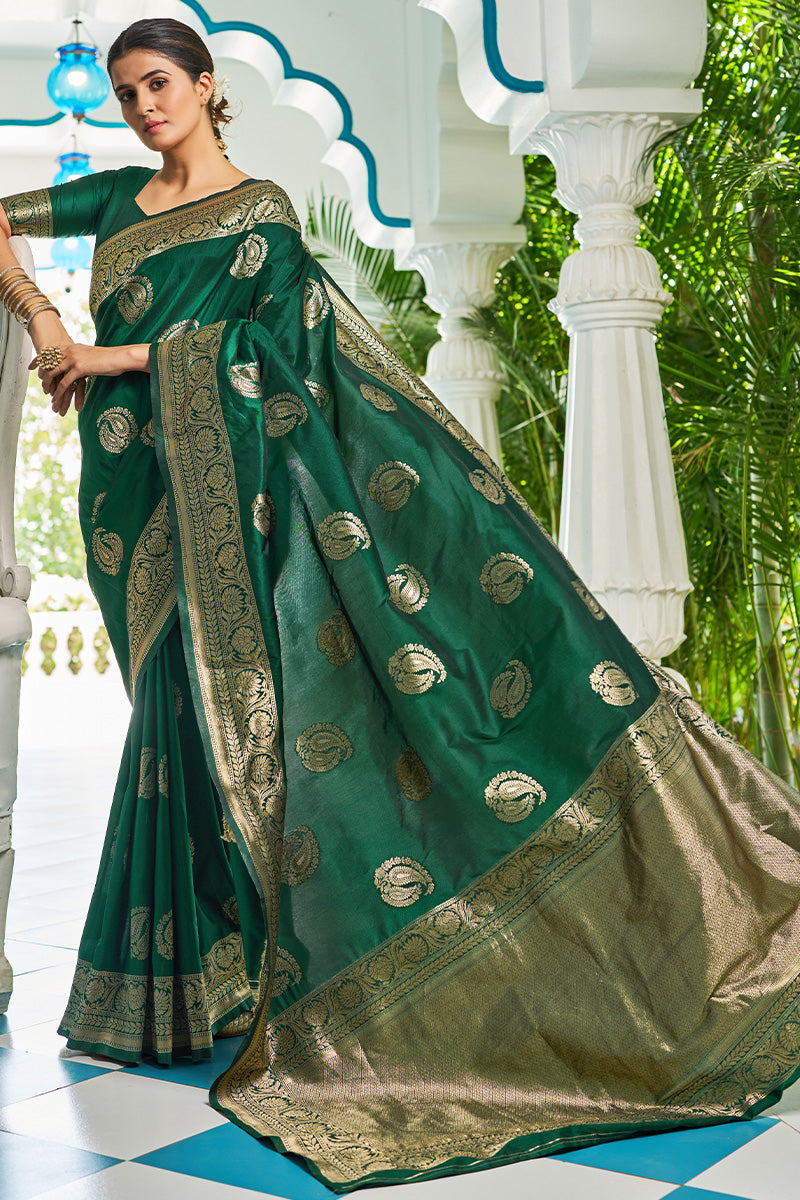 Desirable Dark Green Soft Banarasi Silk Saree With Cynosure Blouse Piece