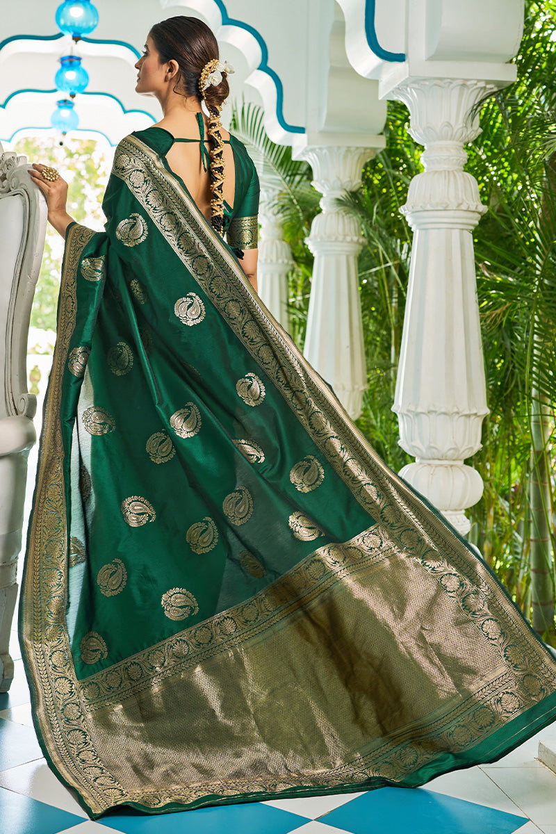 Desirable Dark Green Soft Banarasi Silk Saree With Cynosure Blouse Piece