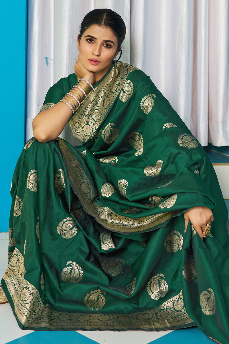 Desirable Dark Green Soft Banarasi Silk Saree With Cynosure Blouse Piece