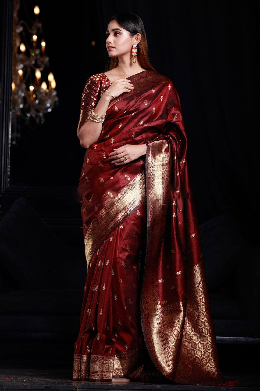 Desultory Maroon Banarasi Silk Saree With Enamoring Blouse Piece