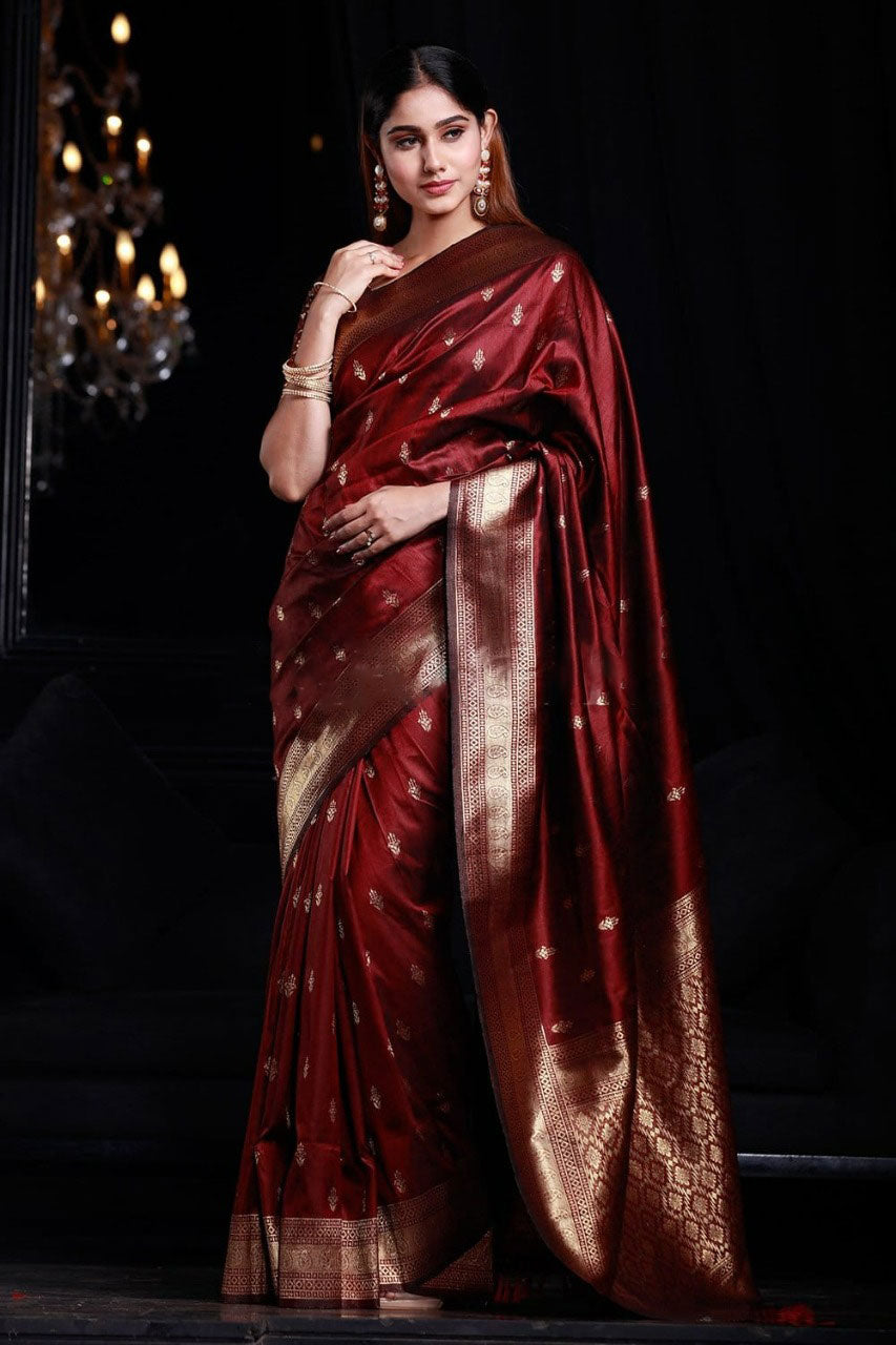 Desultory Maroon Banarasi Silk Saree With Enamoring Blouse Piece