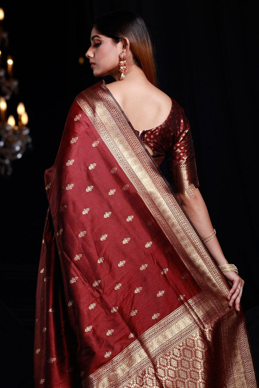 Desultory Maroon Banarasi Silk Saree With Enamoring Blouse Piece