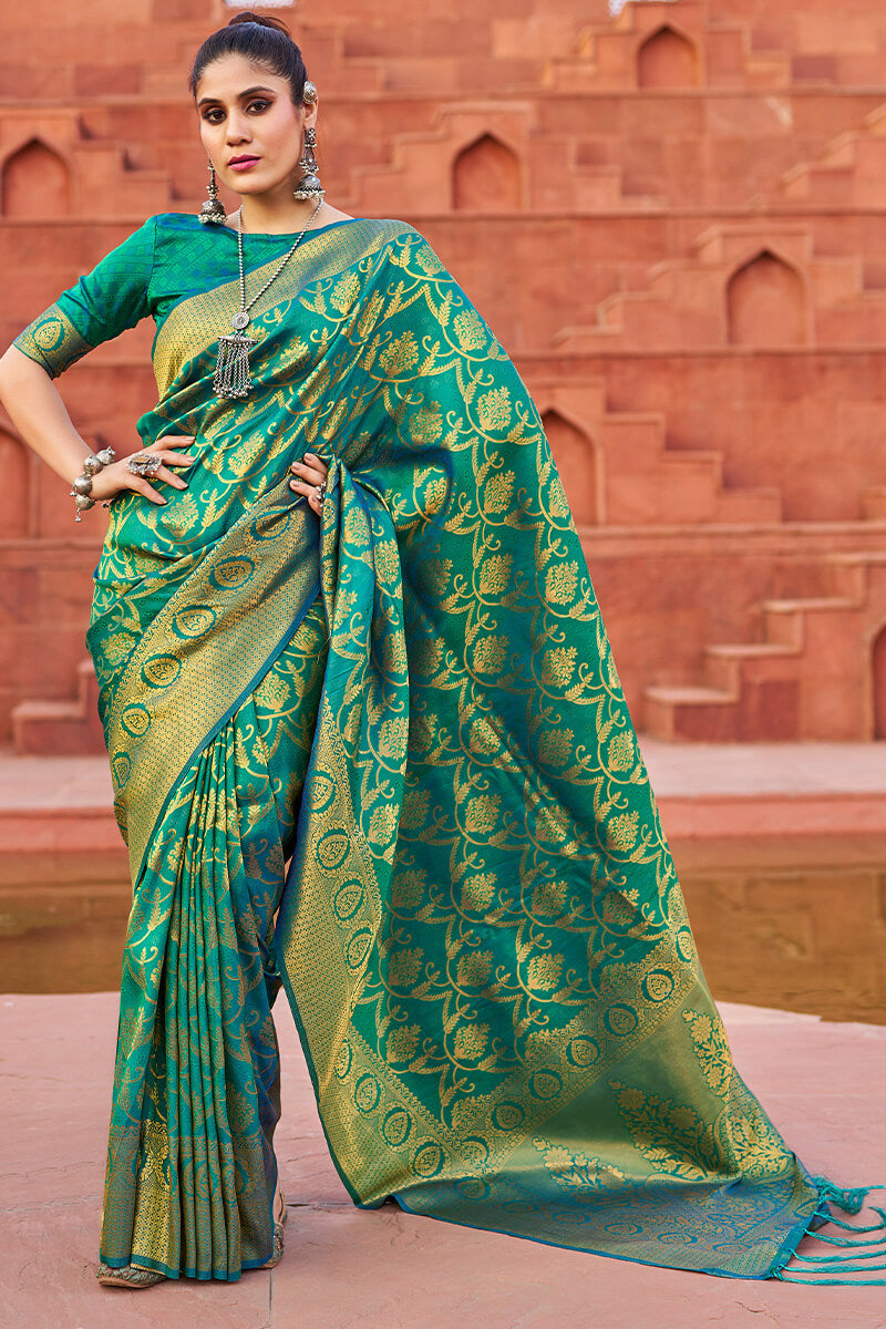 Desuetude Rama Banarasi Silk Saree With Gossamer Blouse Piece