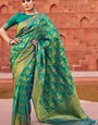 Desuetude Rama Banarasi Silk Saree With Gossamer Blouse Piece