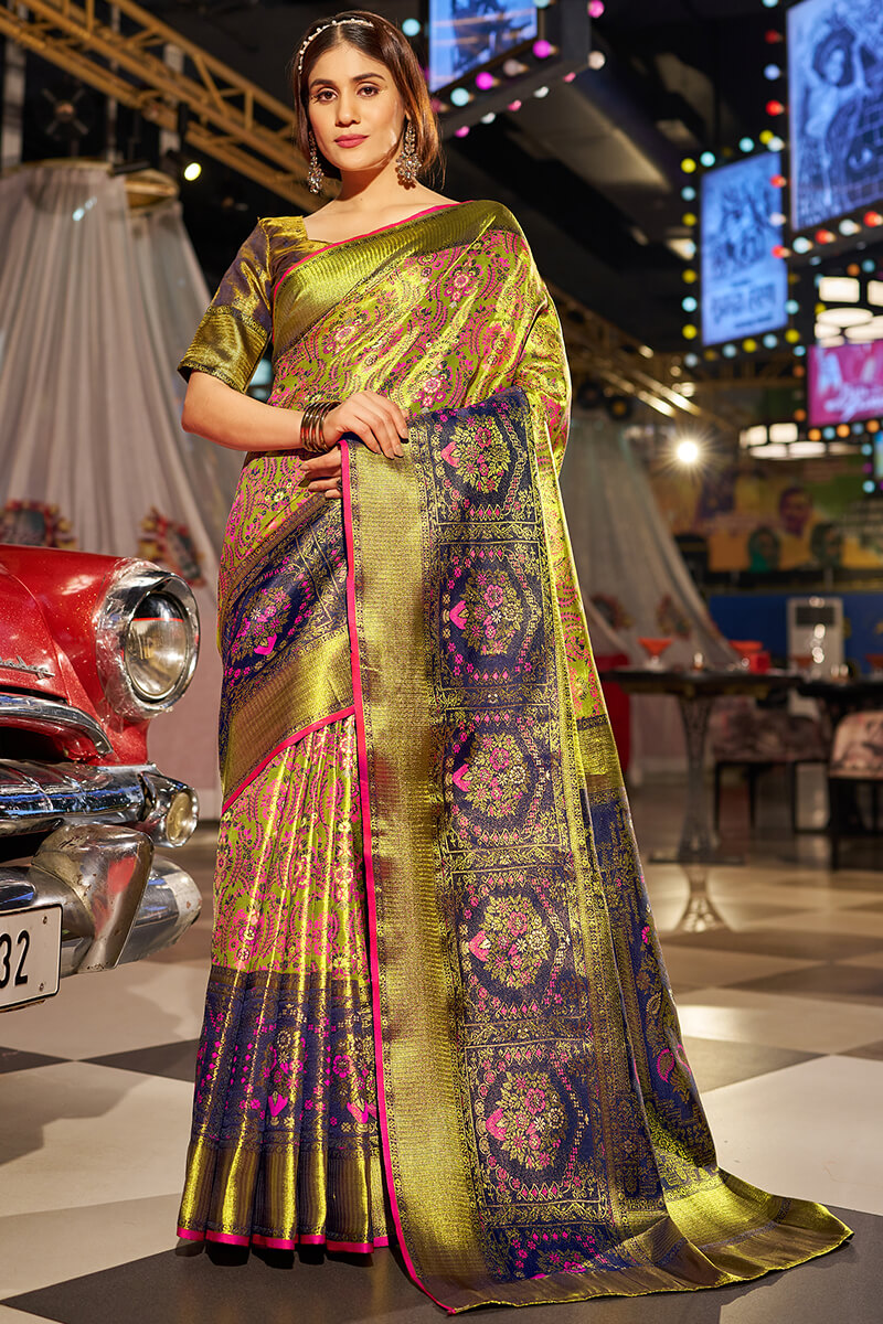 An insanely Mehndi Kanjivaram Silk Saree With Majesty Blouse Piece