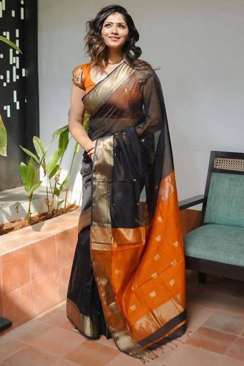 Entrancing Black Cotton Silk Saree With Beleaguer Blouse Piece