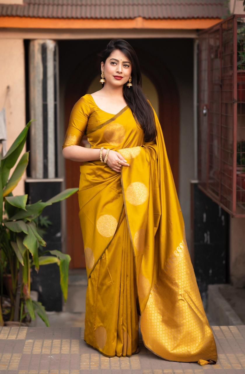 Posh Yellow Soft Silk Saree With Glittering Blouse Piece