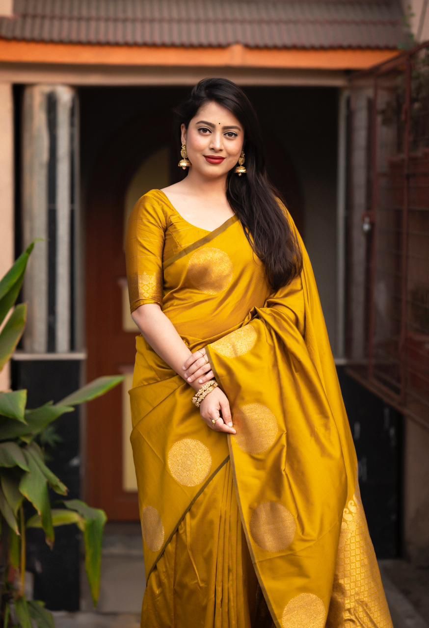 Posh Yellow Soft Silk Saree With Glittering Blouse Piece