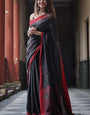 Mesmeric Black Cotton Silk Saree With Stunning Blouse Piece