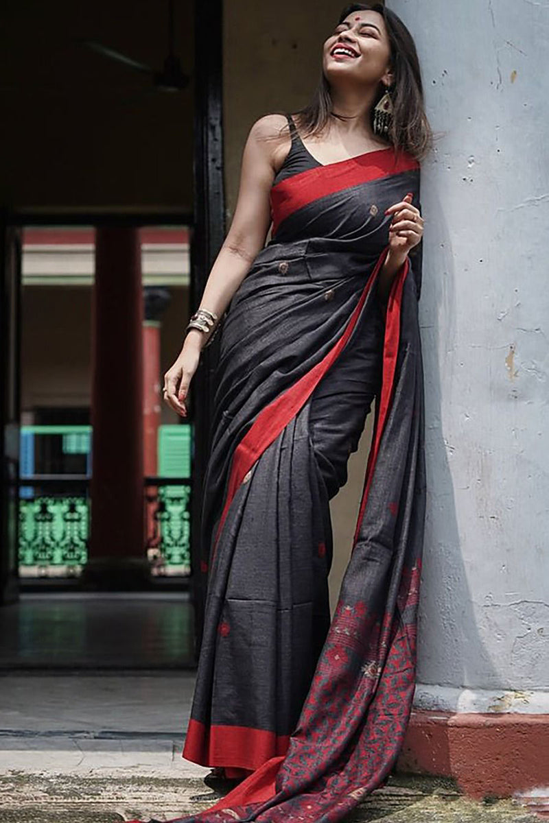 Mesmeric Black Cotton Silk Saree With Stunning Blouse Piece