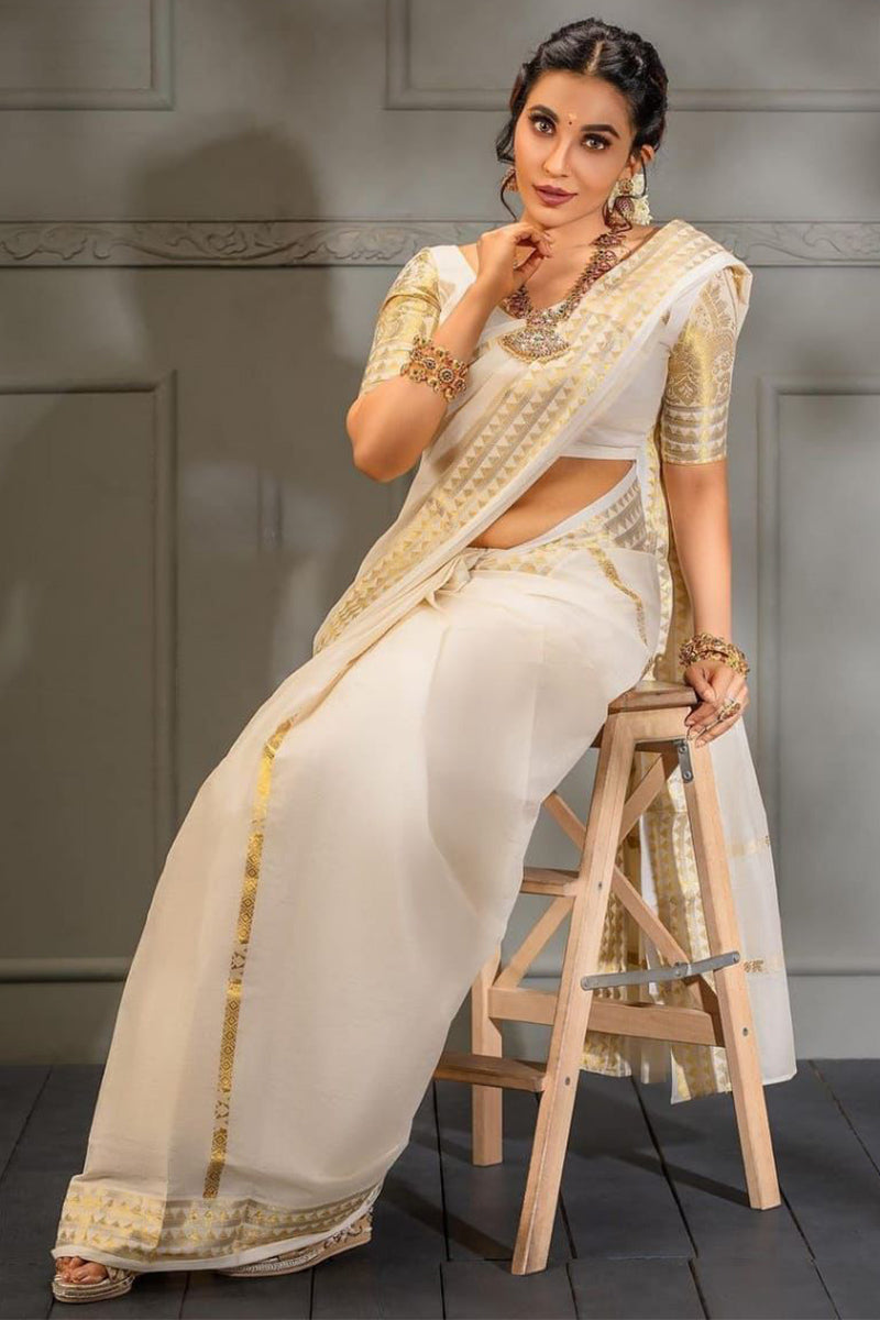 Blooming Off White Soft Silk Saree With Brood Blouse Piece