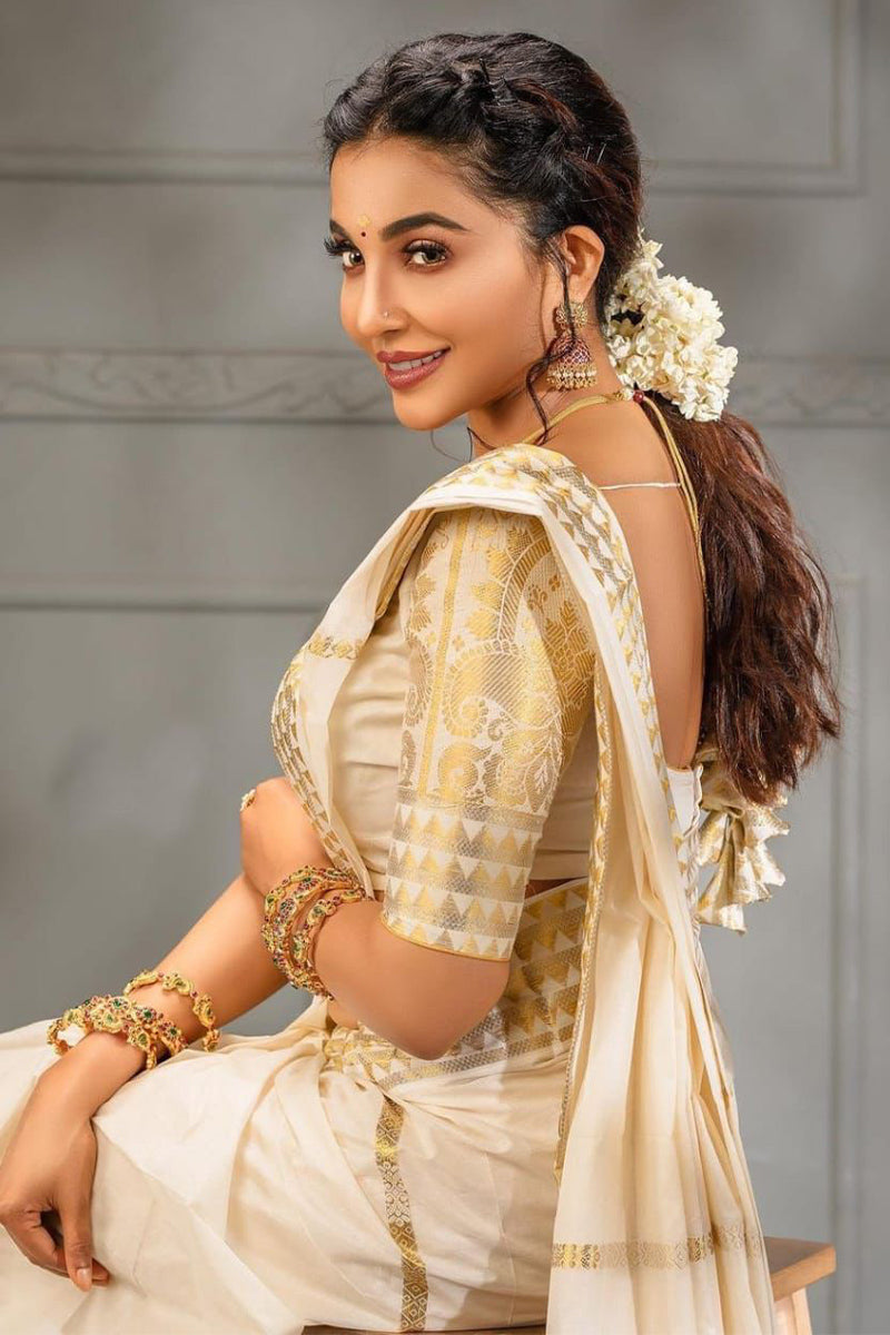 Blooming Off White Soft Silk Saree With Brood Blouse Piece