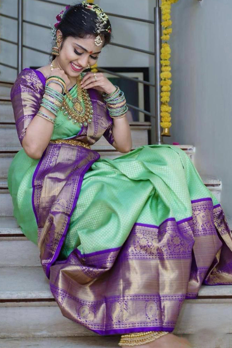 Arresting Sea Green Soft Silk Saree With Bewitching Blouse Piece