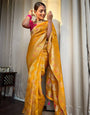 Demanding Yellow Soft Silk Saree With Ebullience Blouse Piece