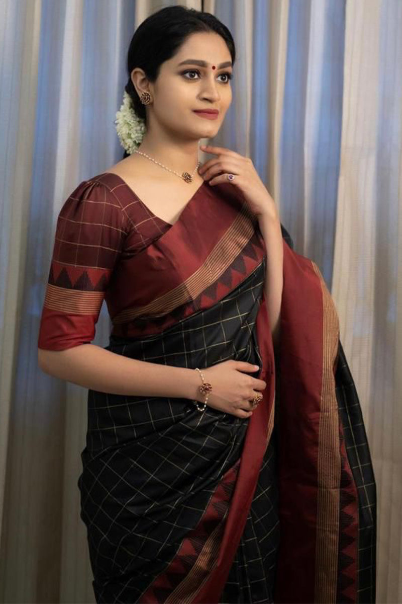 Chatoyant Black Soft Silk Saree With Entrancing Blouse Piece