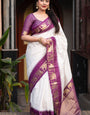 A dreamy Off White Soft Silk Saree With Elision Blouse Piece