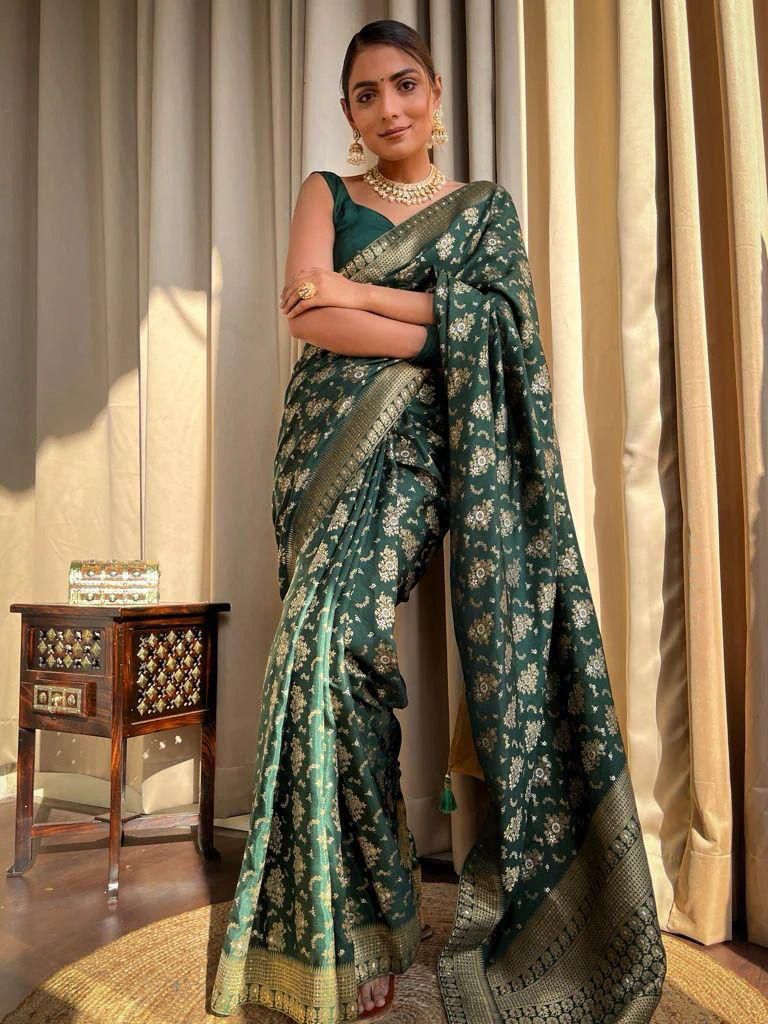 Tempting Dark Green Soft Silk Saree With Rhapsody Blouse Piece