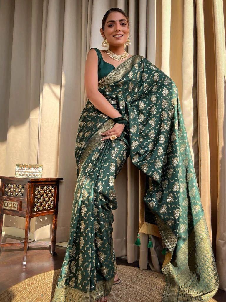 Tempting Dark Green Soft Silk Saree With Rhapsody Blouse Piece