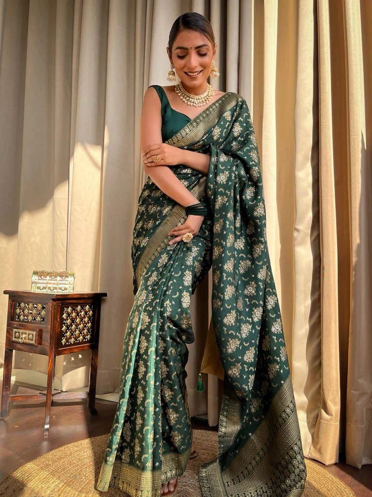 Tempting Dark Green Soft Silk Saree With Rhapsody Blouse Piece