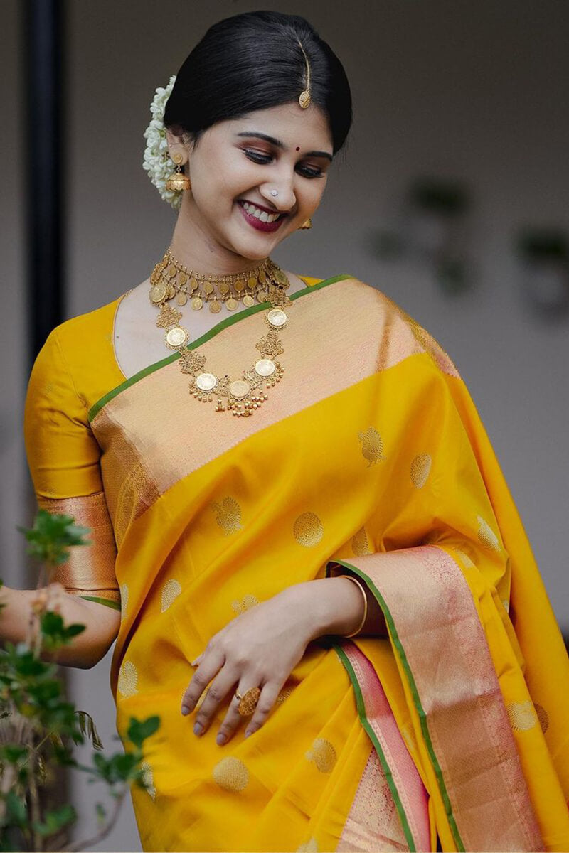 Stylish Yellow Soft Silk Saree With A dreamy Blouse Piece